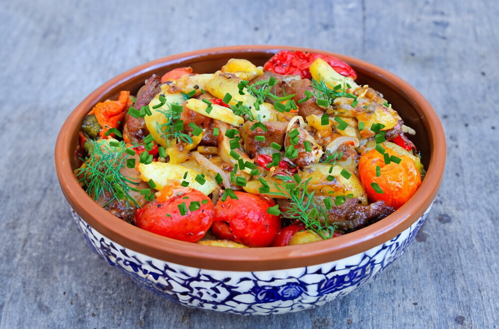 Potatoes with Meat in a Cauldron over Campfire