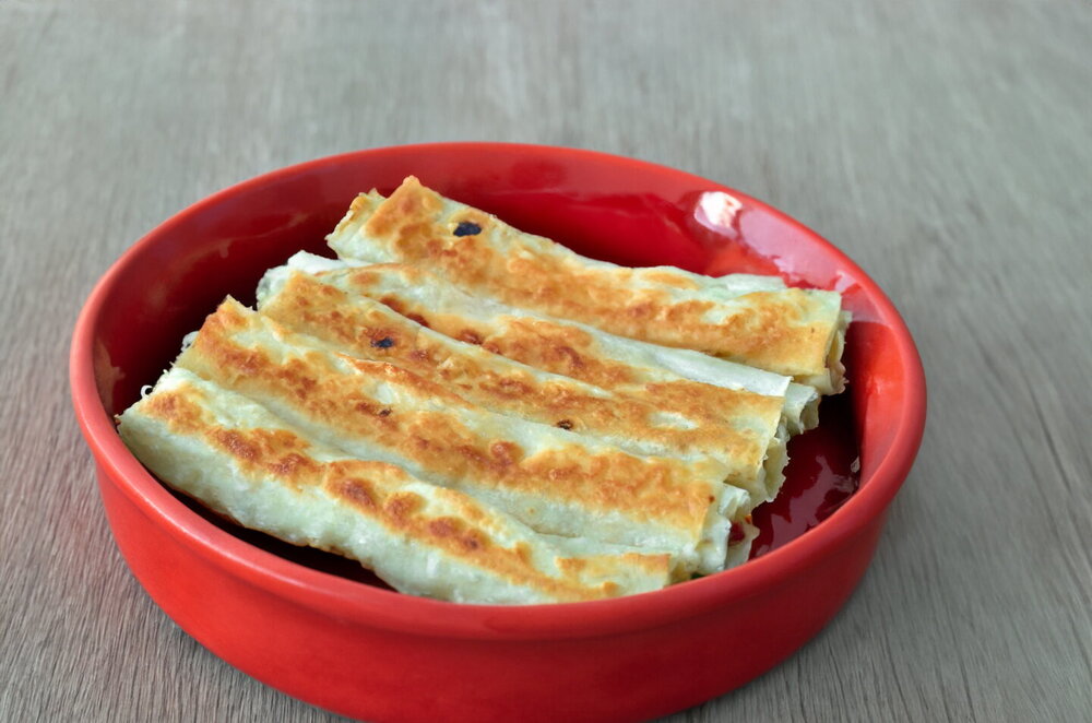 Lavash with Sausage, Cheese, and Egg in a Frying Pan