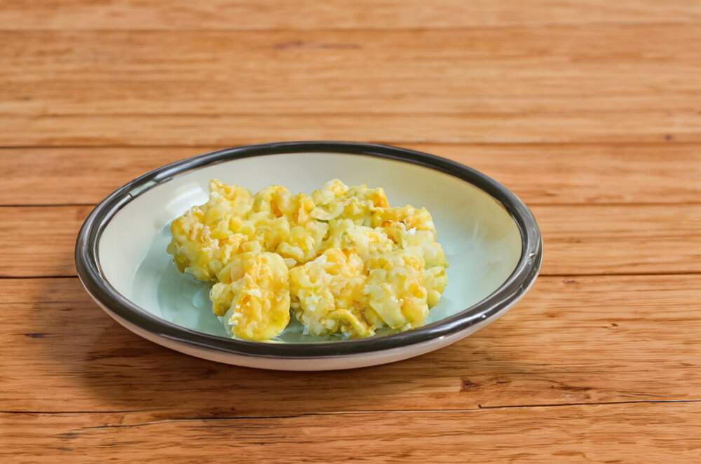 Fried Cauliflower with Egg in a Skillet