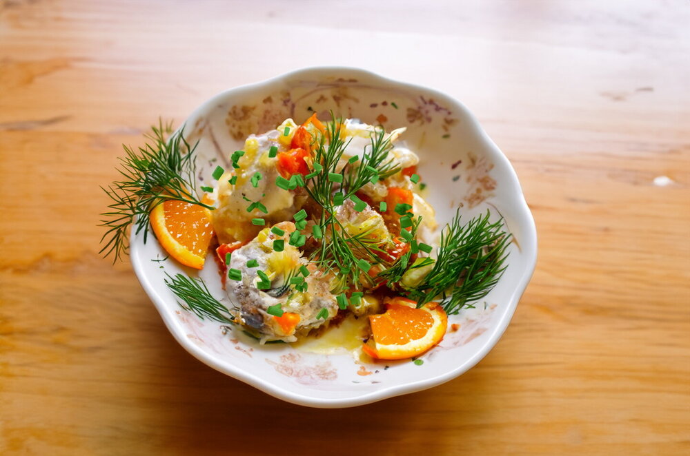 Pollock in Sour Cream with Carrots in a Frying Pan