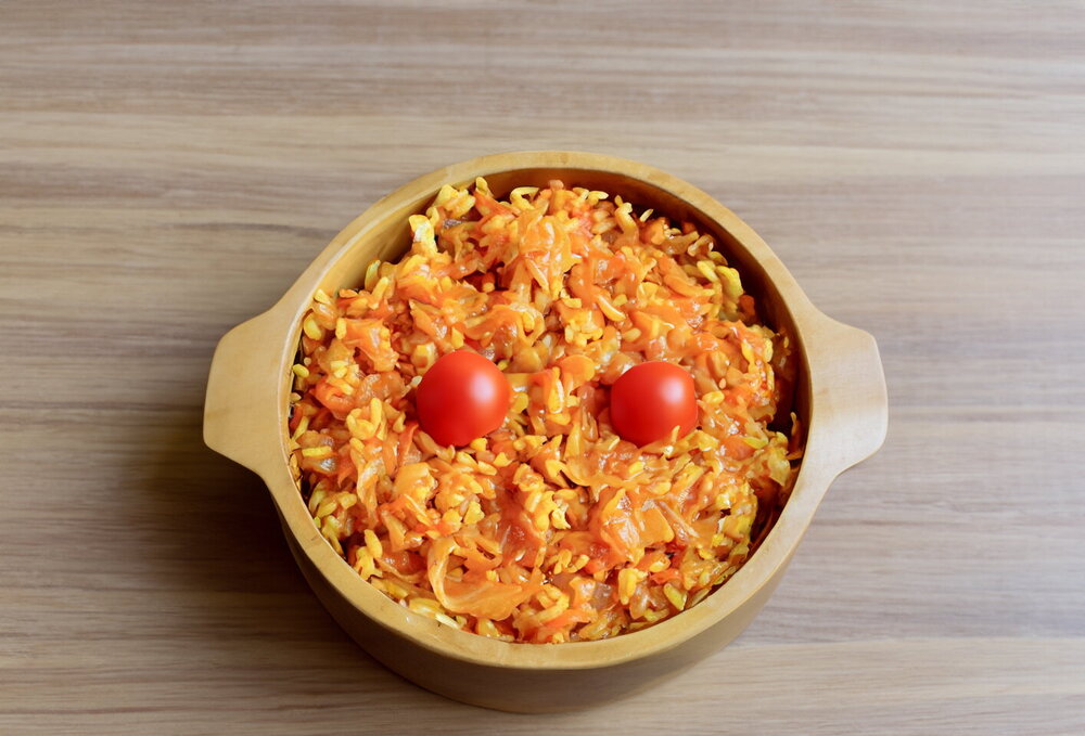 Stewed Cabbage with Rice and Meat in a Frying Pan