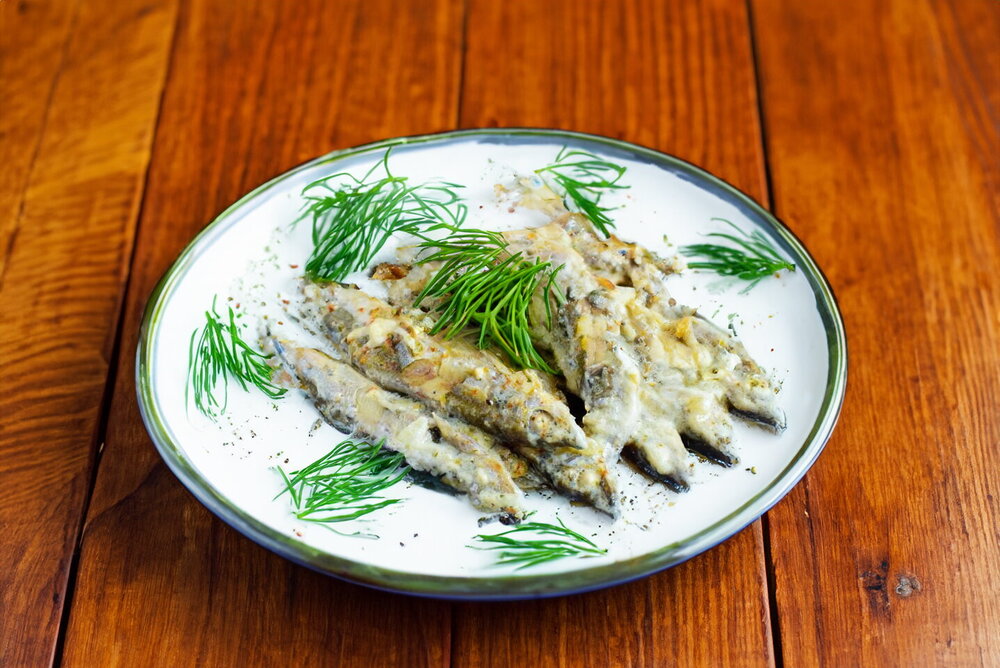 Stewed Capelin with Onions in a Pan