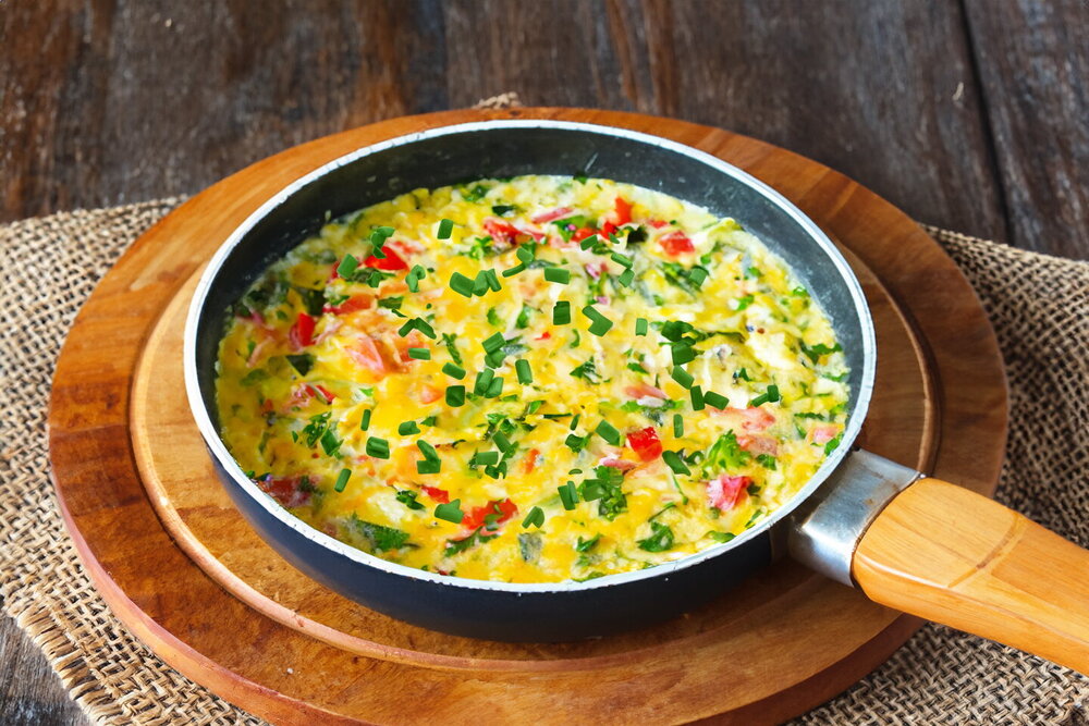 Omelet with Zucchini and Tomatoes in a Pan