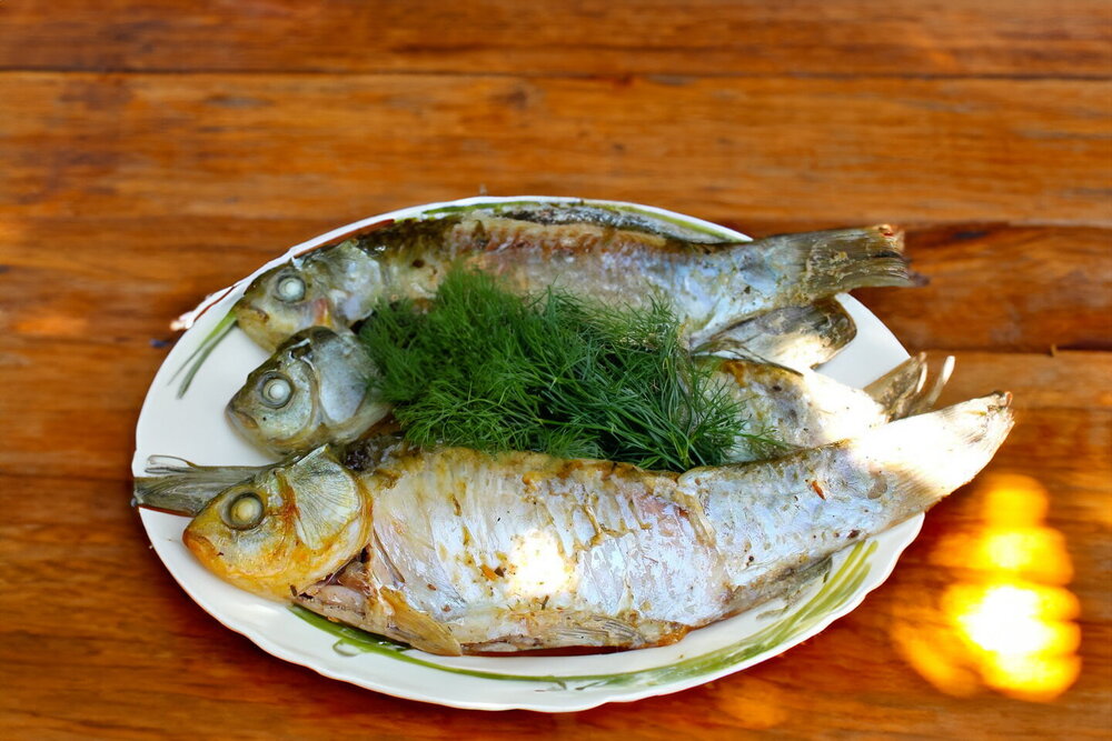 Crucian Carp in Foil with Sour Cream over Charcoal