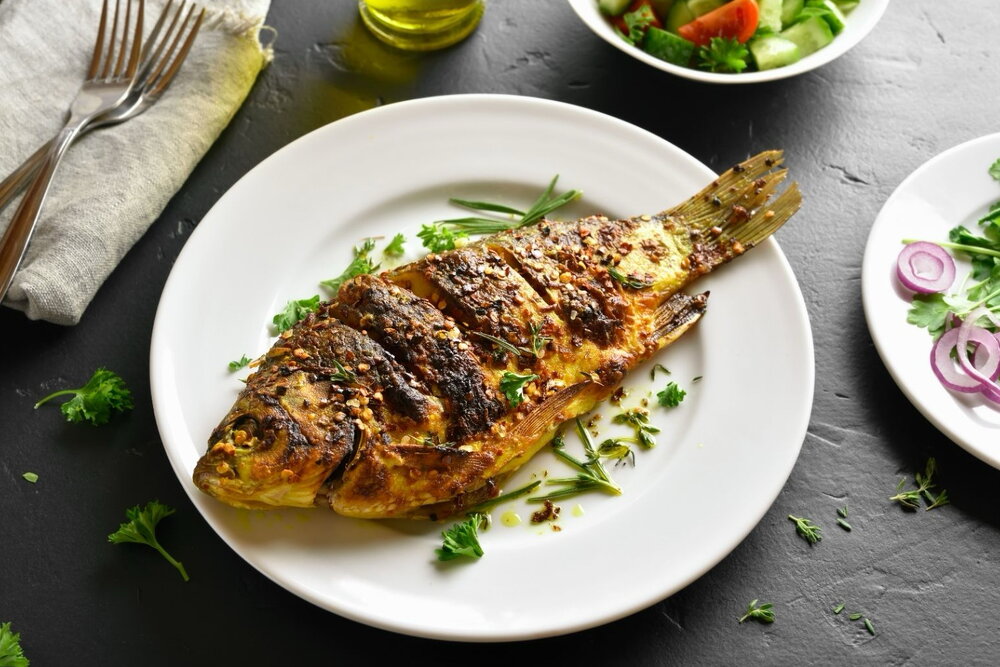 Fennel and herb barbecued whole fish