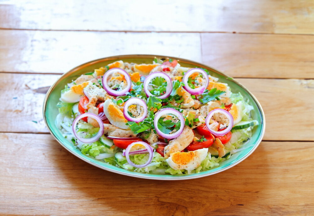 Salad with Chinese Cabbage, Chicken Breast, Cucumber, Egg and Tomatoes