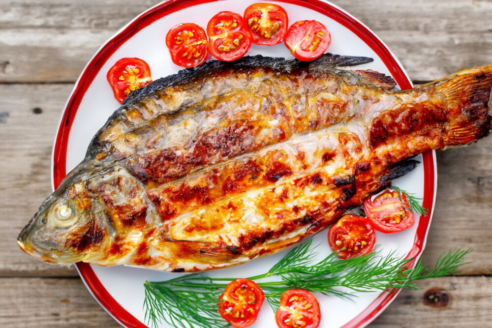Grilled Carp on a Barbecue Grill Basket