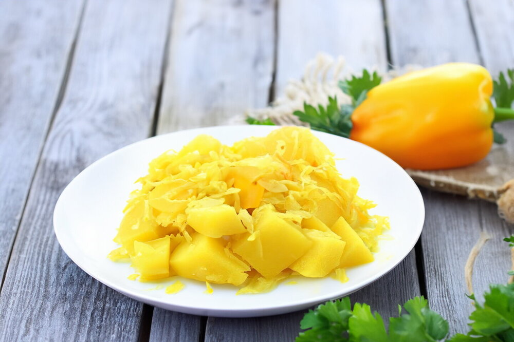 Potatoes Stewed with Sauerkraut in a Cauldron
