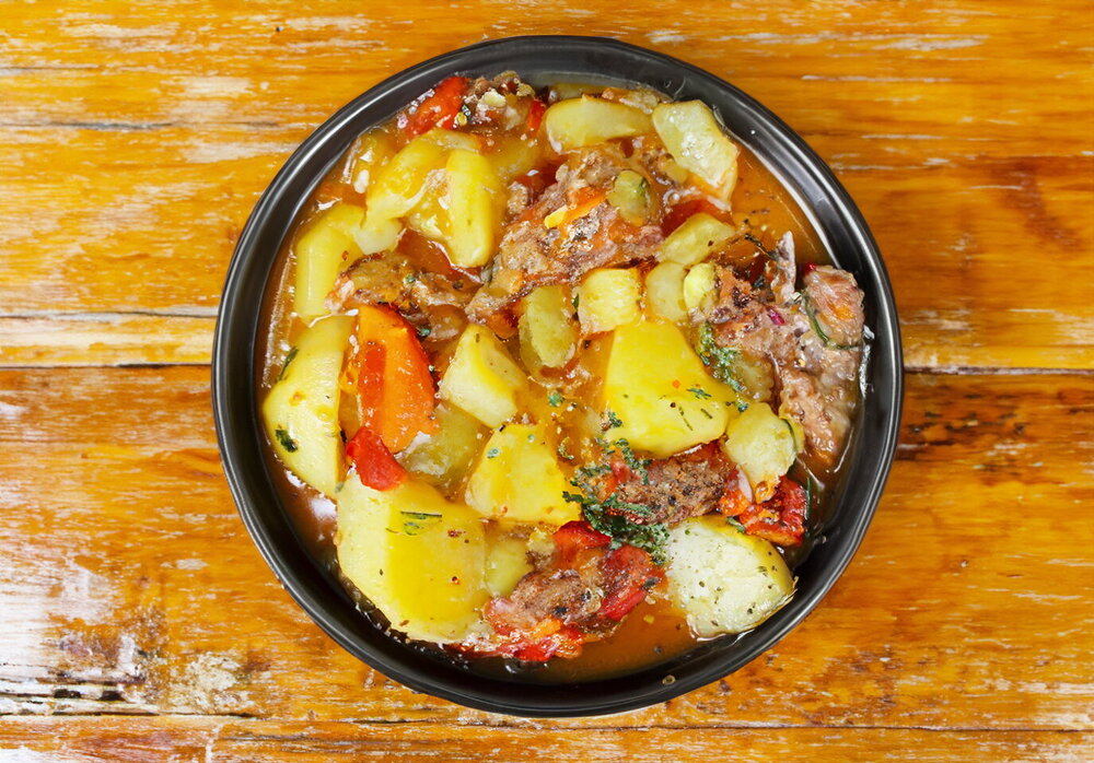 Beer-Braised Beef and Potato Khashlama in a Cauldron