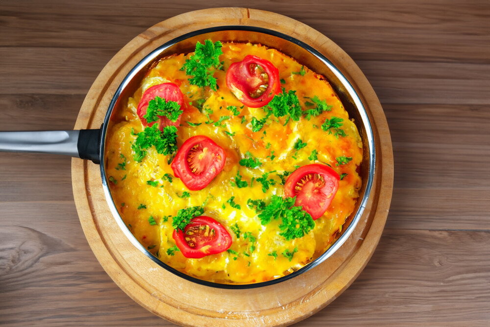 Potatoes in Sour Cream with Cheese Baked in the Oven