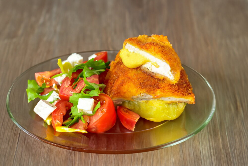 Chicken Breast with Cheese in a Skillet