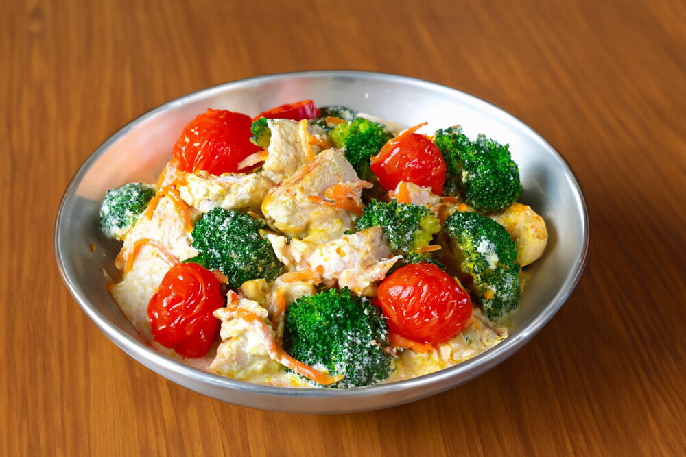 Chicken with Broccoli in Cream Sauce in a Skillet
