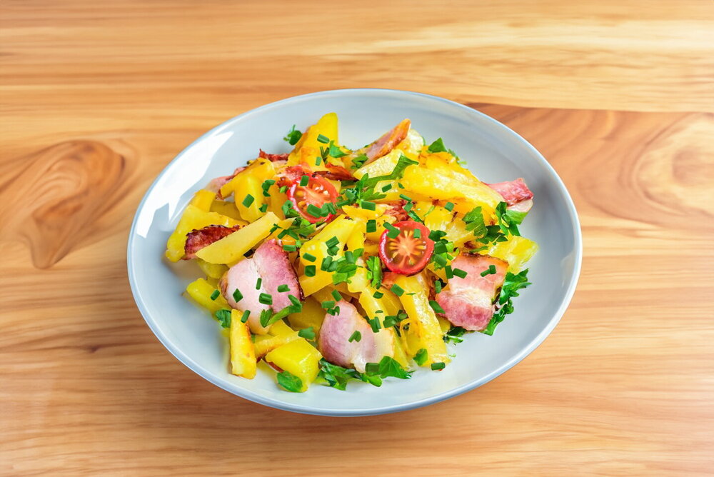 Potatoes with Bacon in a Skillet