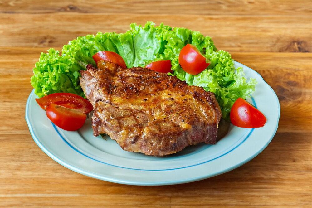 Pork Neck Steak in a Skillet