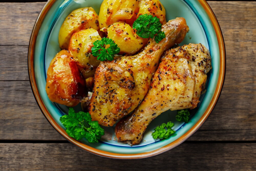 Baked Chicken with Potatoes and Apples in the Oven