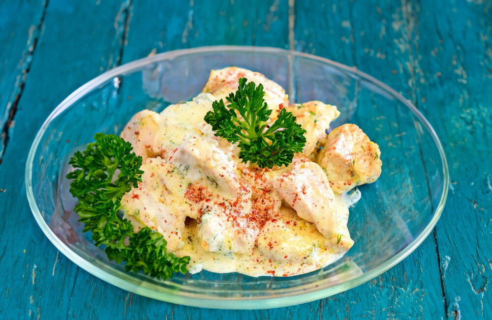 Chicken Breasts in Cream Sauce in a Skillet
