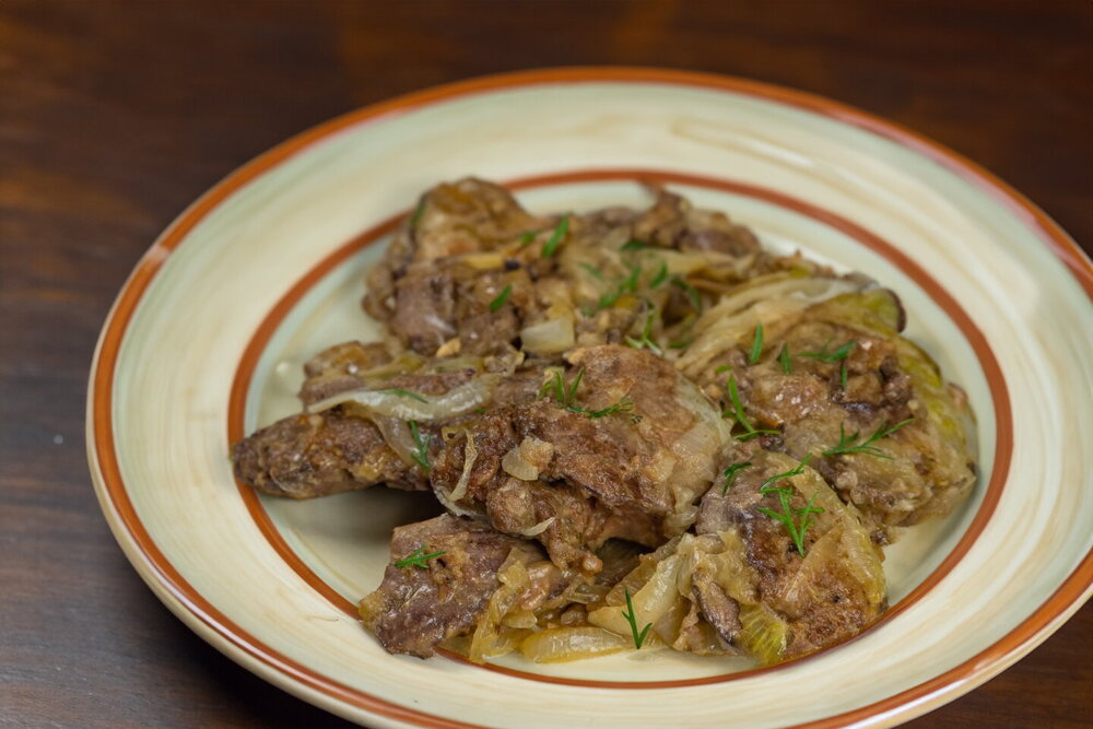 Fried Chicken Liver with Onions in a Skillet