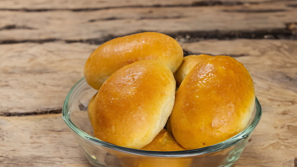 Baked Pirozhki with Fish and Rice Filling