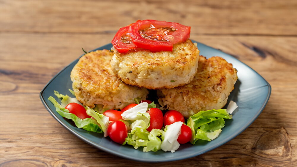 Pollock Fish Patties from Minced Fish on a Skillet