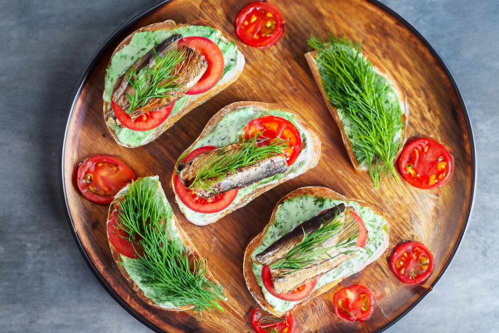 Sandwiches with Sprats, Mayonnaise, and Garlic on White Bread