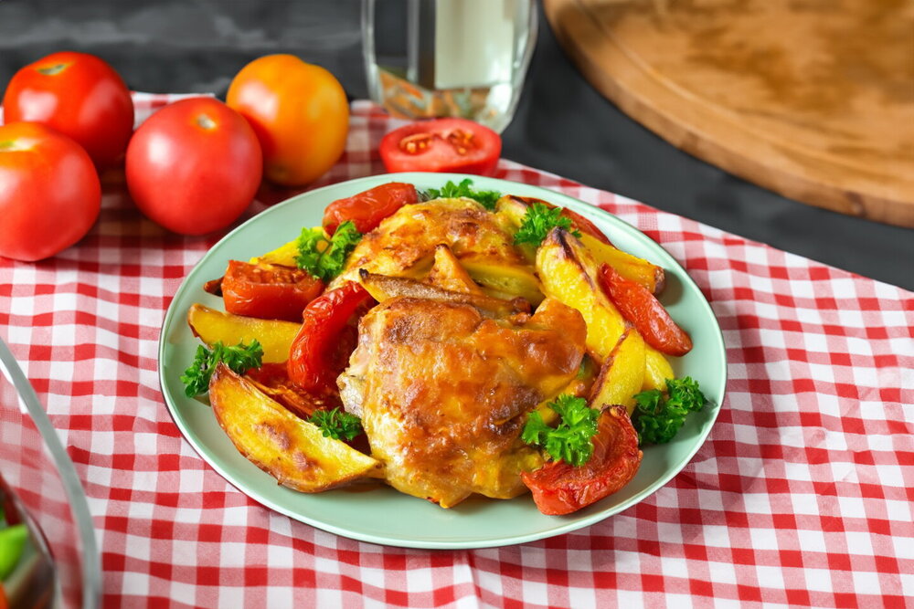 Potatoes with Chicken and Tomatoes in the Oven