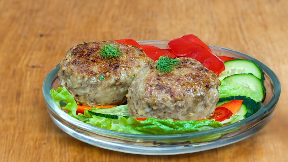 Juicy Minced Meat Patties with Potatoes in a Pan