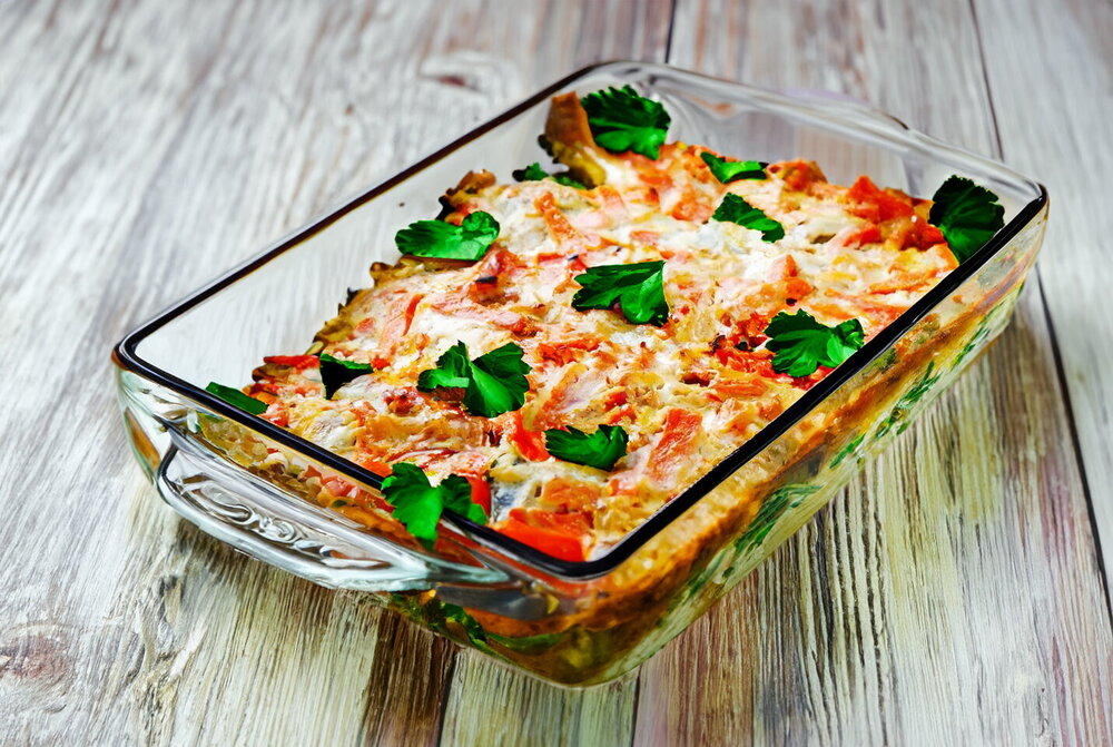 Baked Pollock with Carrots and Onions in Sour Cream