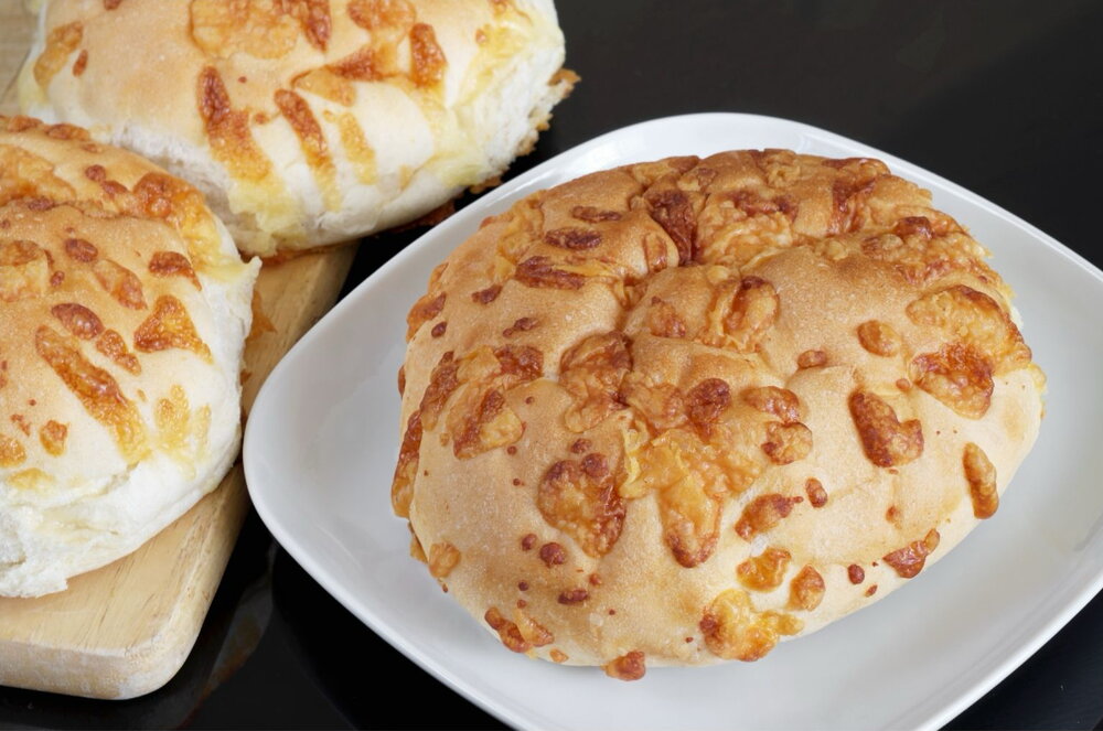 Yeast buns with sausage and cheese