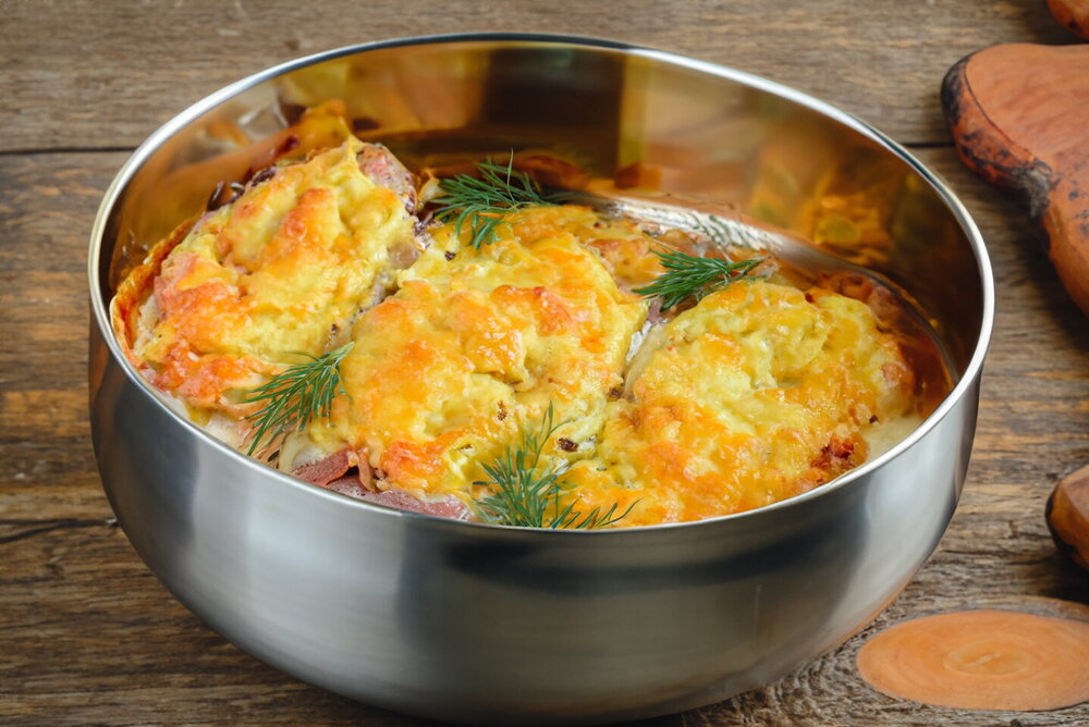 Pork with Onions and Cheese Baked in the Oven