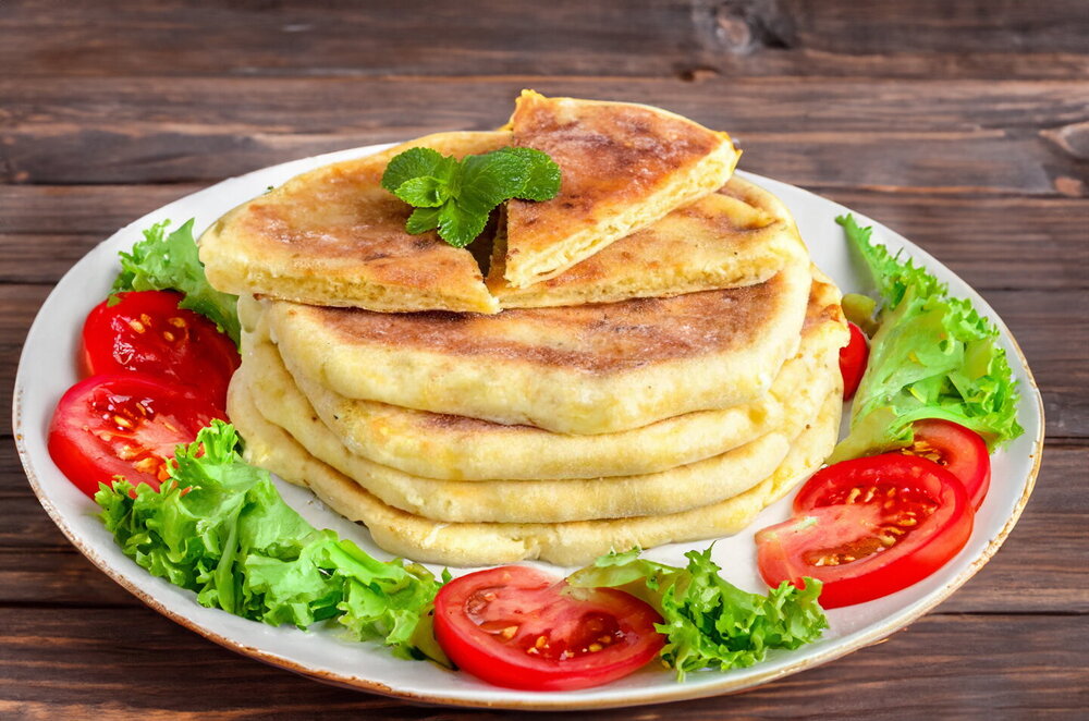 Khachapuri with Kefir and Cottage Cheese on a Skillet