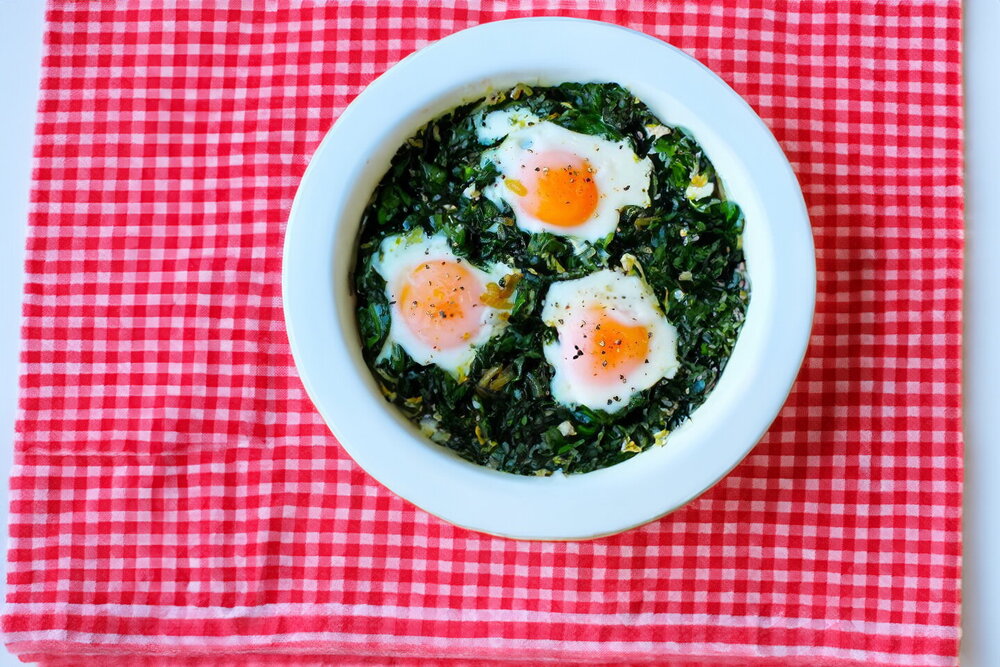 Spinach with Eggs in a Pan