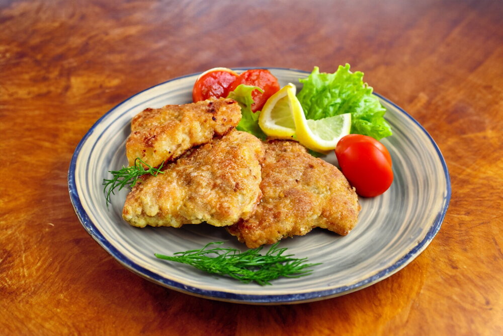 Fried Pollock in Breadcrumbs in a Frying Pan