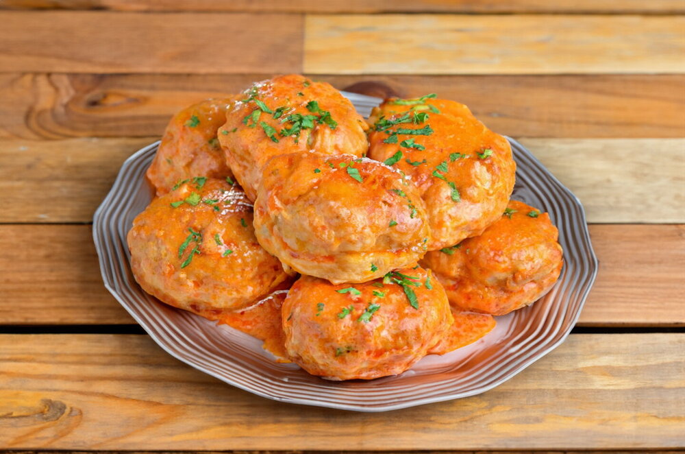 Meat Patties in Tomato Sauce in a Skillet