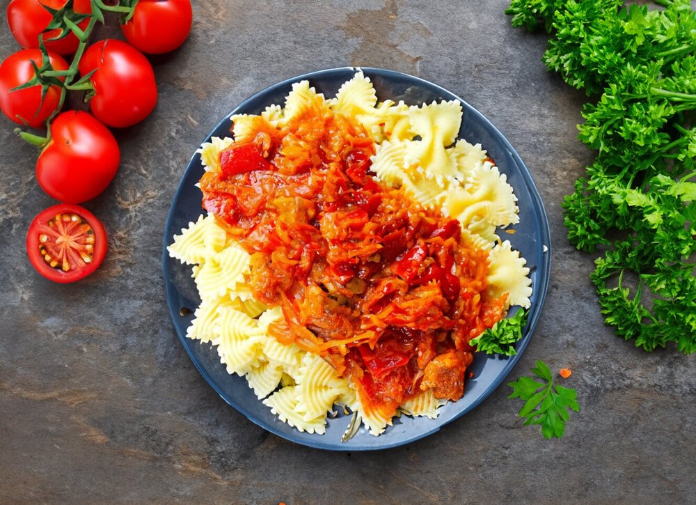 Pork with Tomato Paste in a Skillet