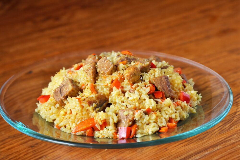 Fluffy Pork Pilaf in a Pot on the Stovetop