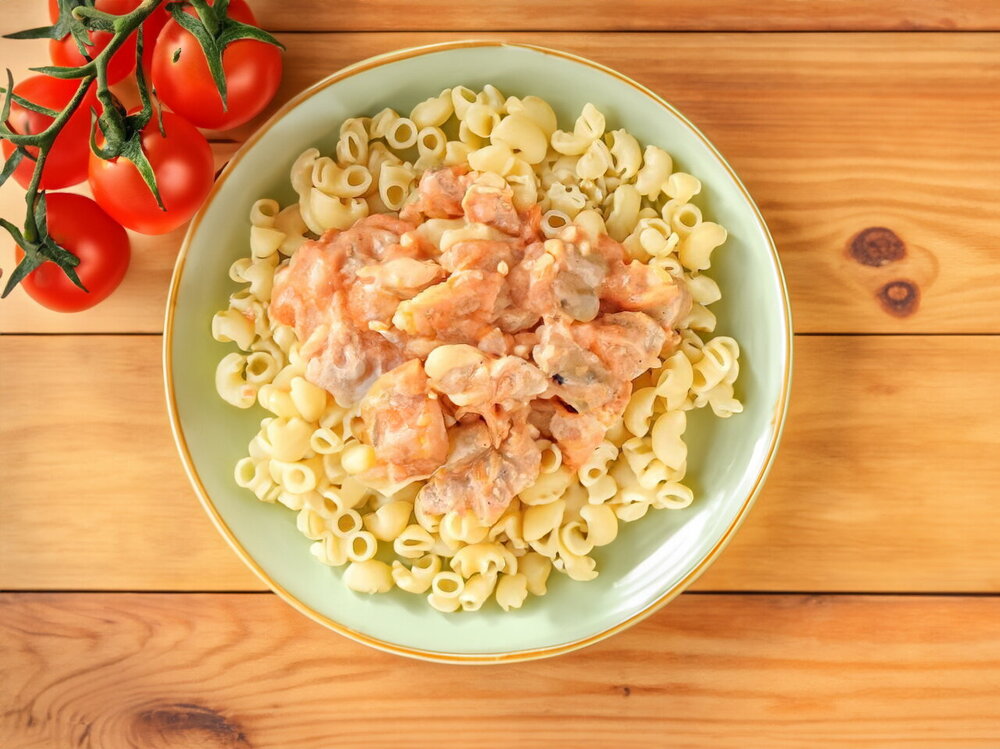 Chicken Gizzards and Hearts Stewed in Sour Cream in a Skillet