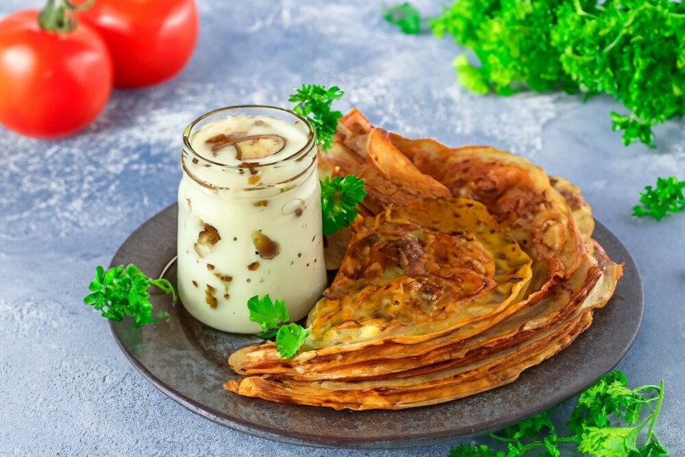 Crepes with creamy mushroom sauce