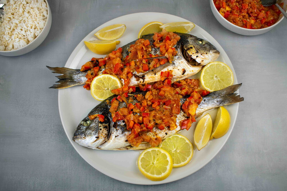 Oven baked dorade with vegetable sauce