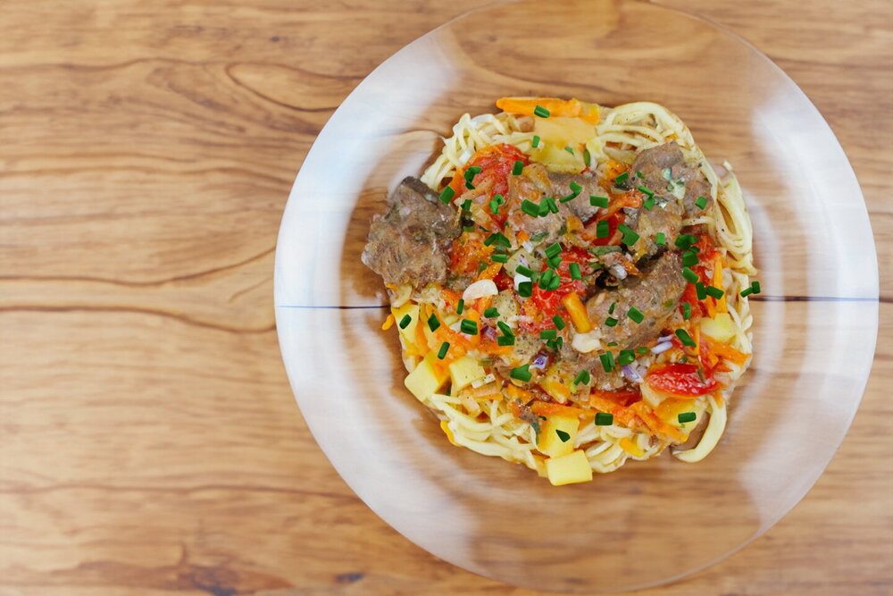 Laghman Cooked over a Fire in a Cauldron