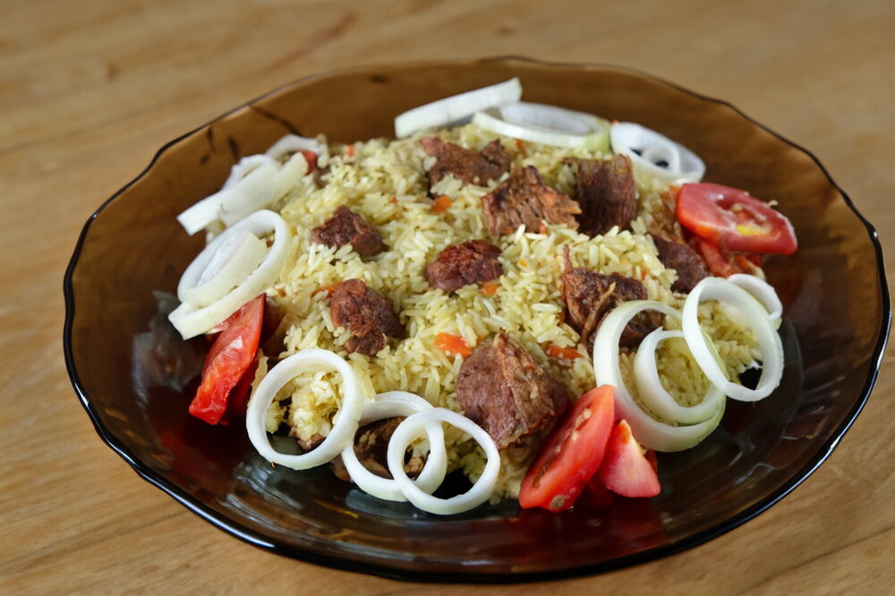 Beef Pilaf in a Cauldron on the Stovetop