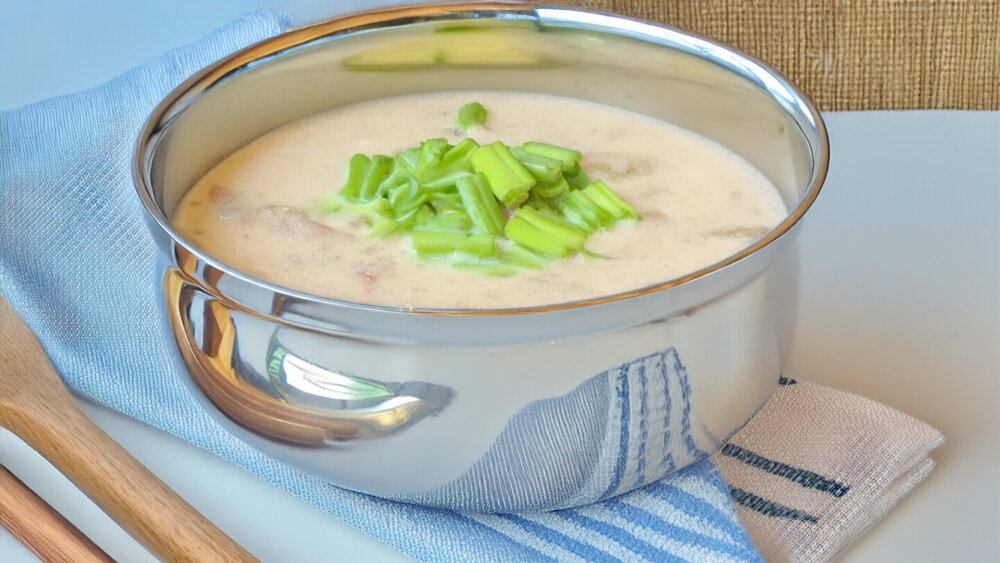 Potato Soup with Ham and Soft Cheese in Chicken Broth