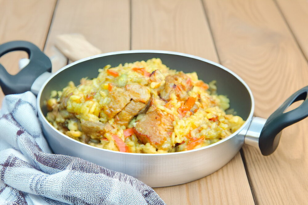 Pork Pilaf over a Fire in a Cauldron