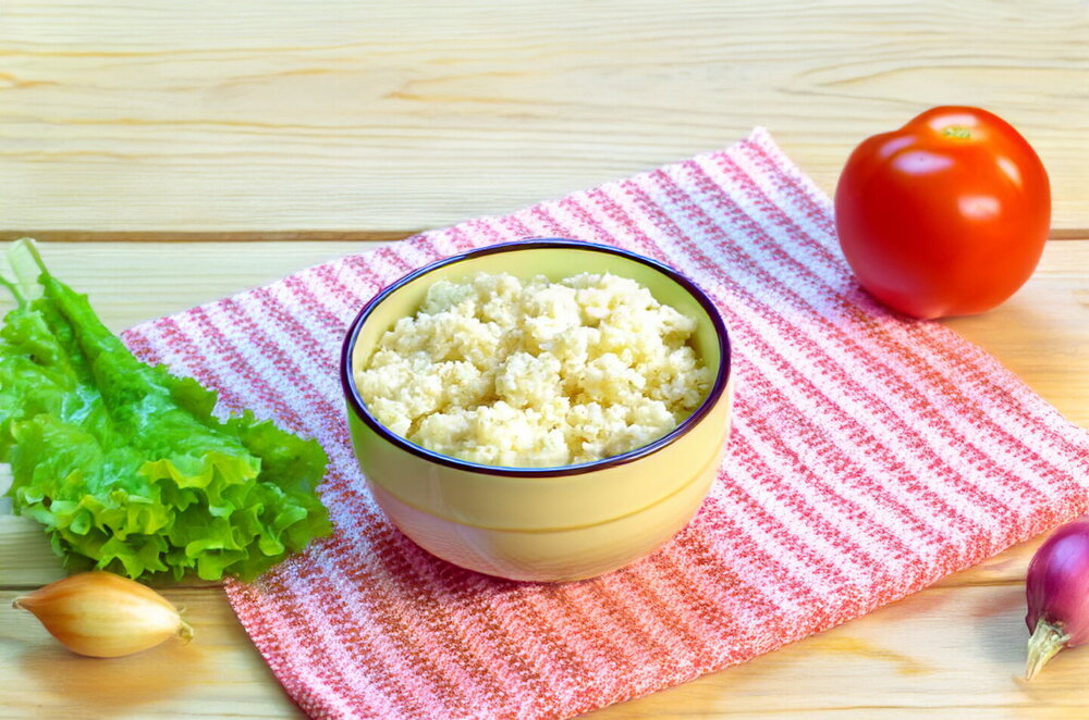 Fluffy Millet Porridge with Water in a Pot