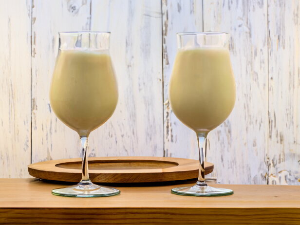 Piña Colada Cocktail with a Cherry Fruit Garnish