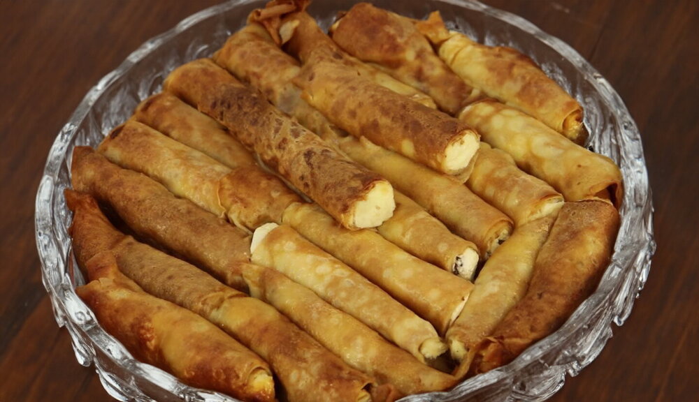 Baked Crepes with Curd Cheese and Raisins