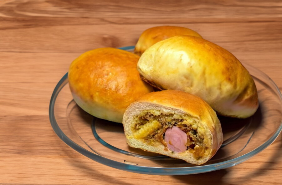 Baked Yeast Hand Pies with Potato, Cabbage, and Sausage