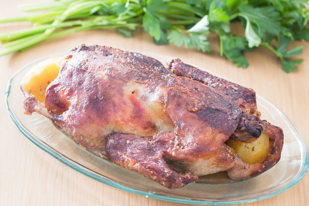 Stuffed Oven-Baked Duck in a Roasting Sleeve with Potatoes