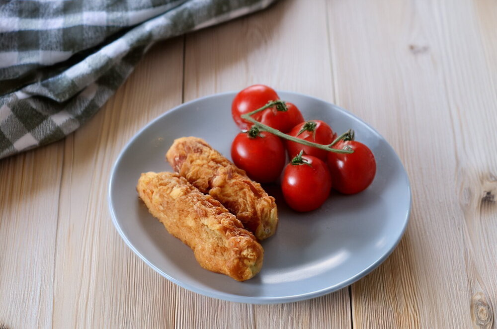 Pan-fried sausages in batter