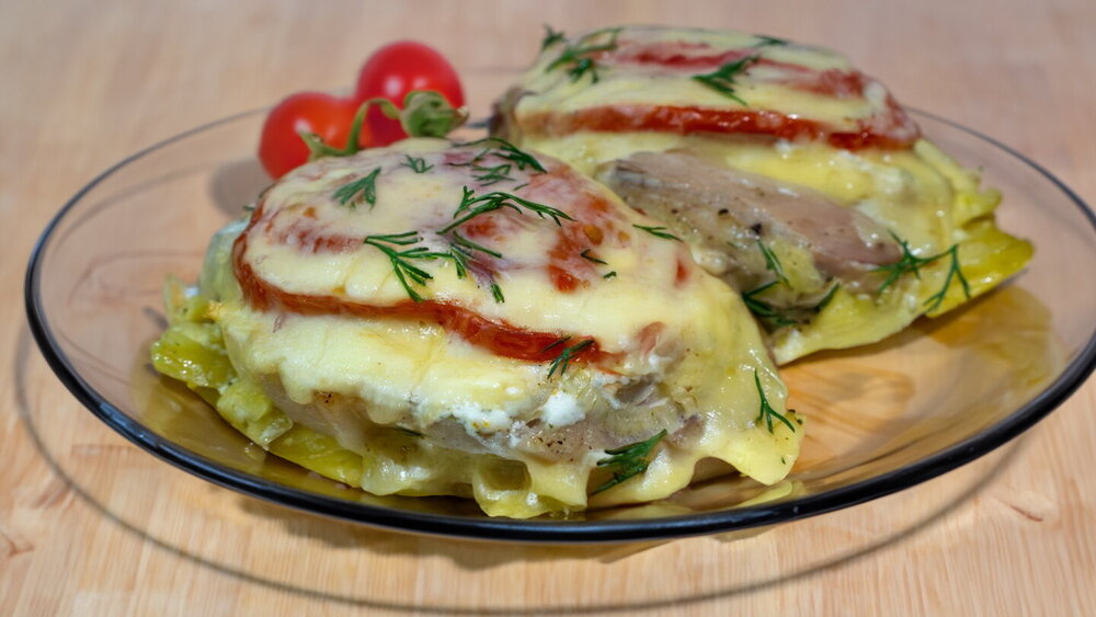 Oven-Baked Pork with Potatoes, Tomatoes and Cheese