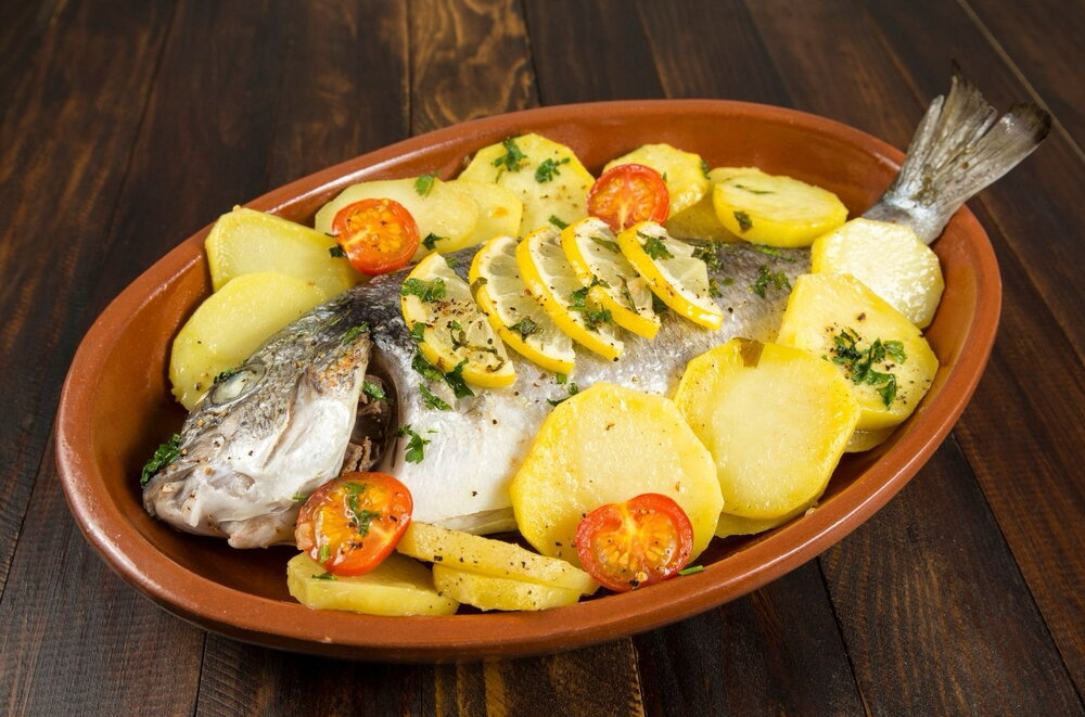 Oven baked fish with potatoes